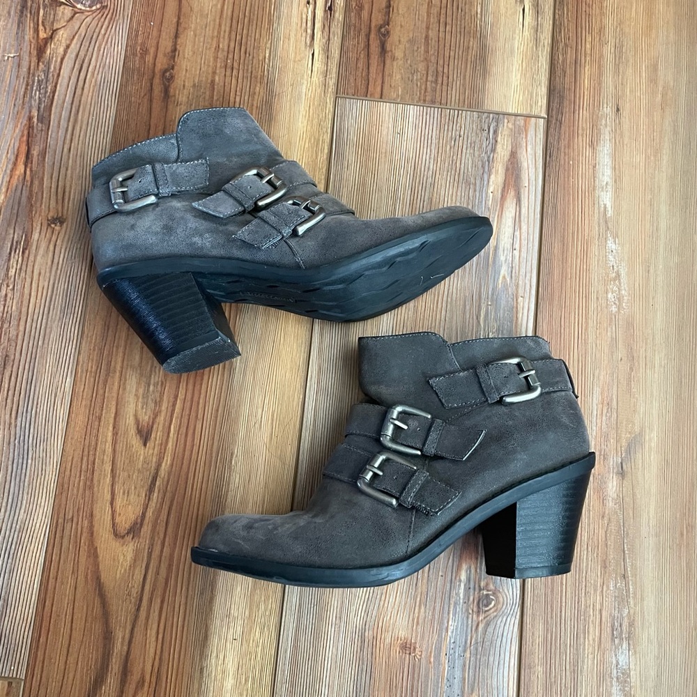 Gray heeled buckle strap ankle boots